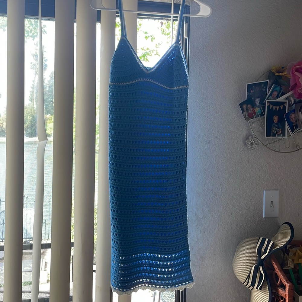 I bought this handmade dress with the intention of wearing it.. it's so adorable